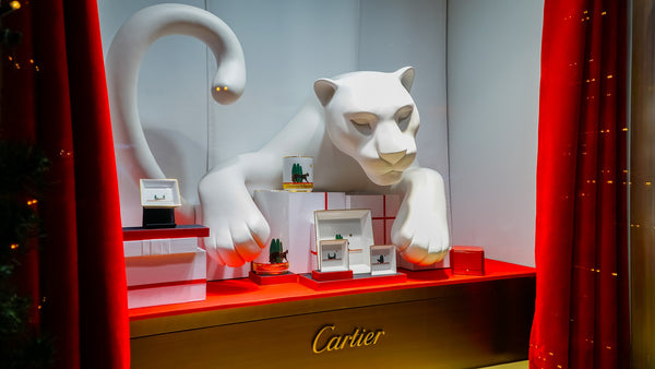 Cartier christmas shop window with Cartier symbol - white panther