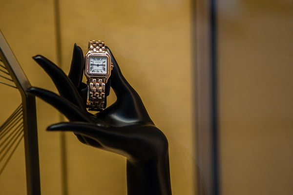Luxury store Cartier, lady's watch on stad in a shape of a delicate hand