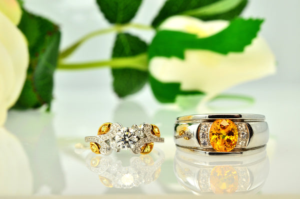 Stunning Yellow sapphire and Diamond Ring with white rose in the background
