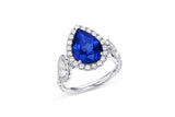Platinum Three-Stone Pear-Shaped Blue Sapphire and Diamond Halo Engagement Ring