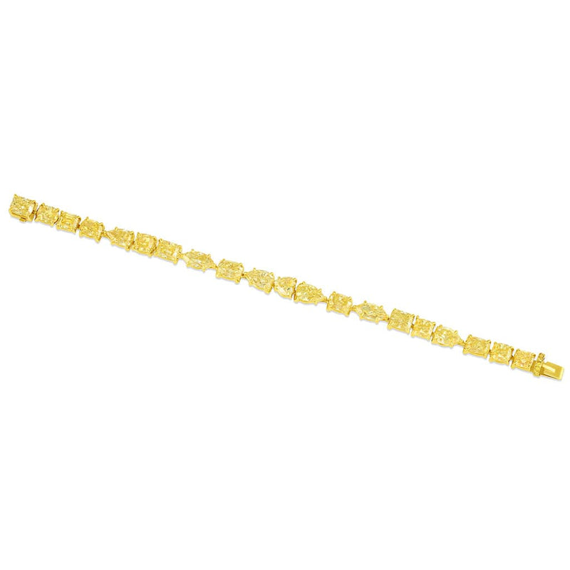 Rivière 18kt Yellow Gold Fancy Intense Yellow Diamond Multi-Shaped Bracelet, GIA Certified