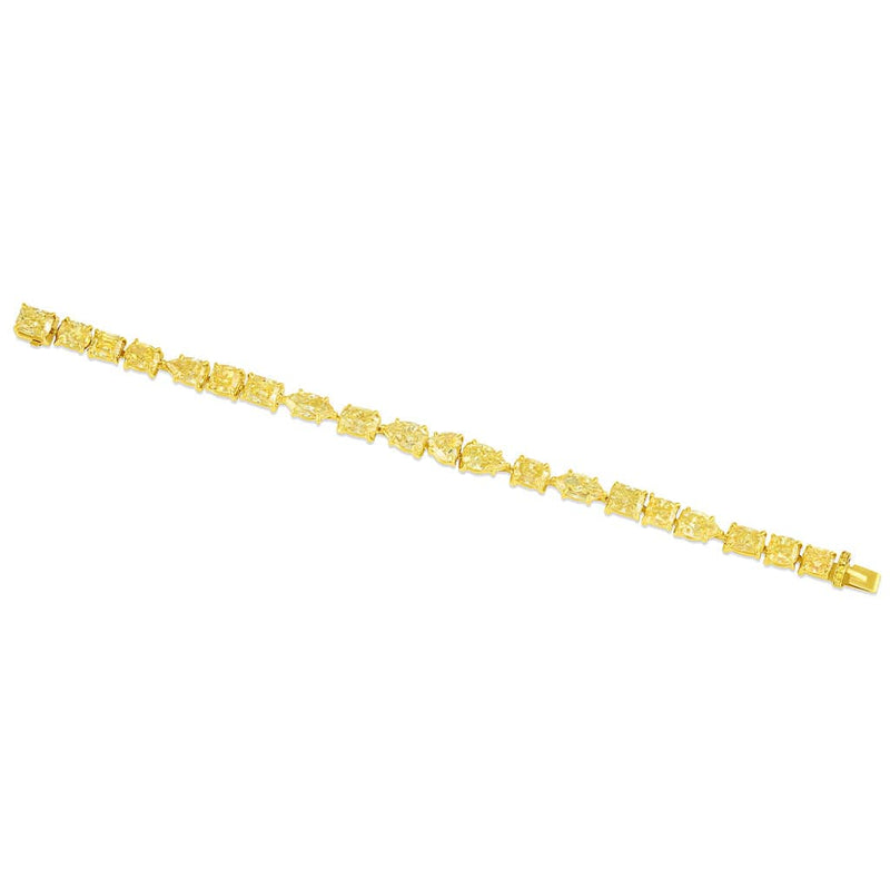 Rivière 18kt Yellow Gold Fancy Intense Yellow Diamond Multi-Shaped Bracelet, GIA Certified